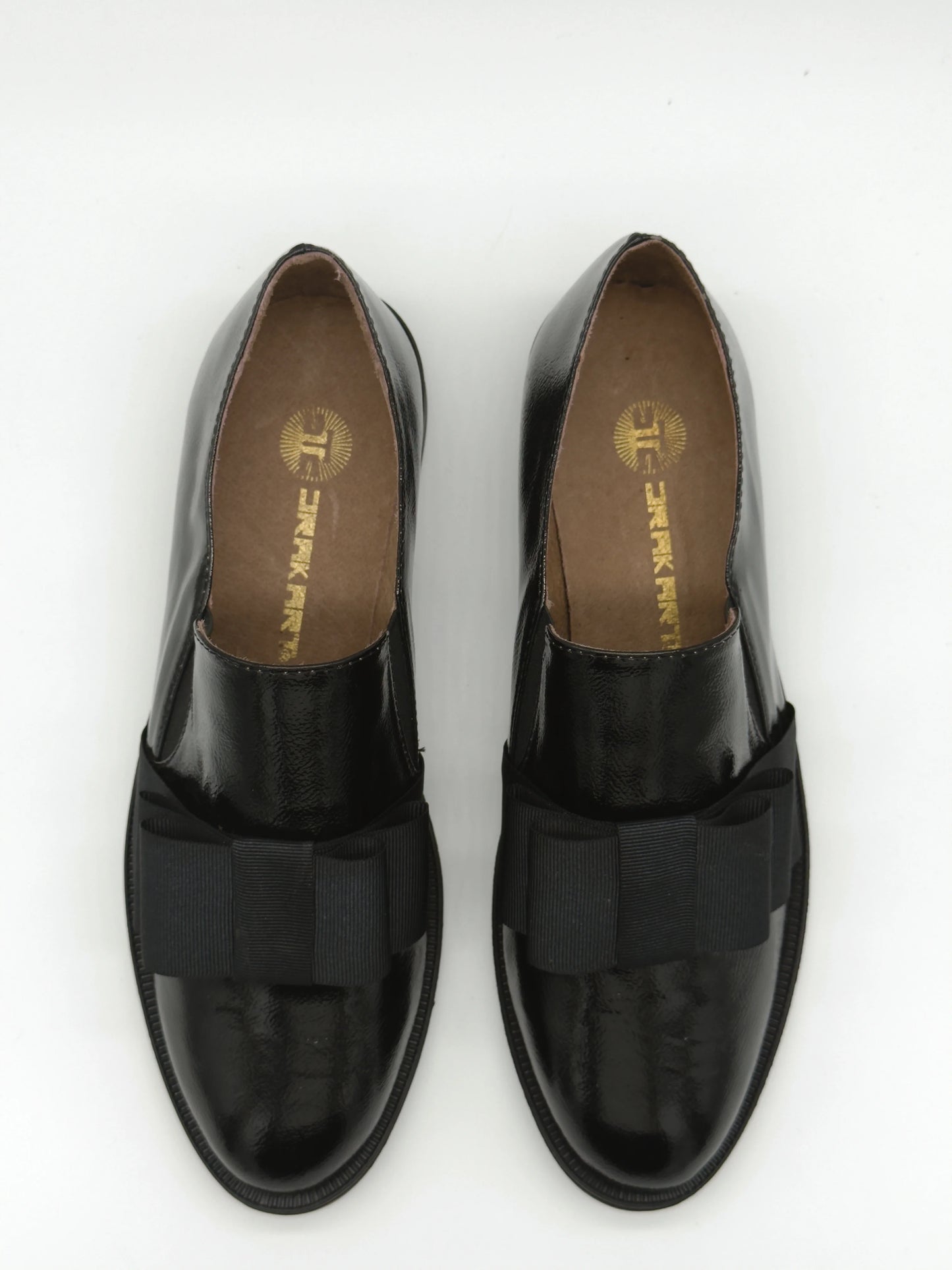 Mocasines negros clásicos para mujer con lazo elegante