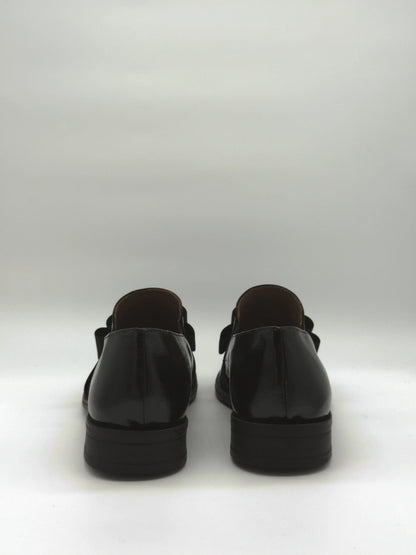 Mocasines negros clásicos para mujer con lazo elegante