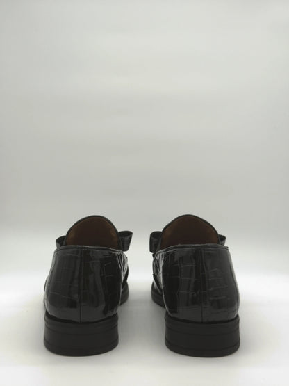 Mocasines negros clásicos para mujer con lazo y detalle dorado